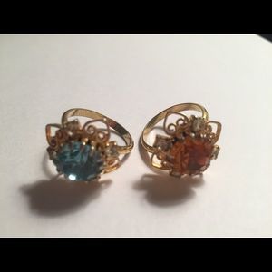 Blue and yellow stoned rings